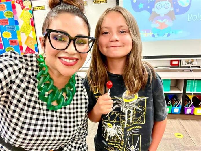  Ms Silva and a former student